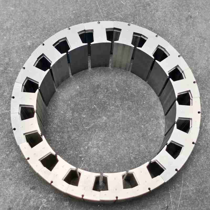Segment stator manufacturing process with precision stamping Segment stator manufacturing process with precision stamping